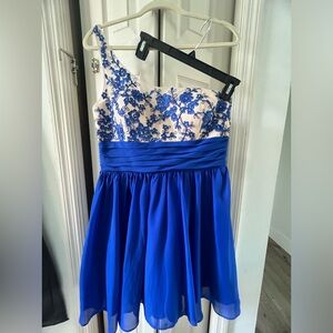 Off shoulder blue dress with floral embroidery on bodice.
